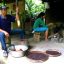 Kopi Luwak coffee cleaning process wooden mortar pestle bali indonesia